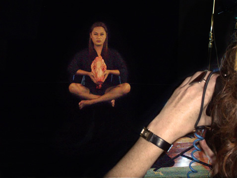 Shigeyuki Kihara being photographed by Rebecca Swan. Photo by Kirsty MacDonald.
